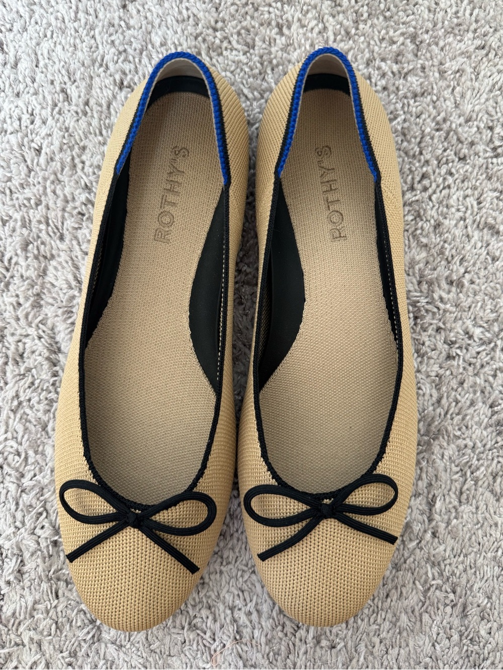 Rothy's Tan Round Toe Ballet Flats with Black Trim and Bow - Picture 2 of 11